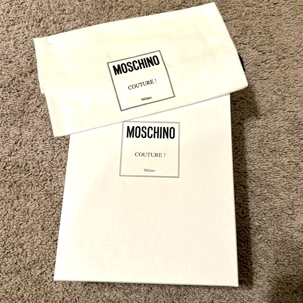 Empty Moschino box with dust bag